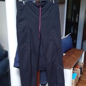 Scrub pants and two scrub tops. Size med.